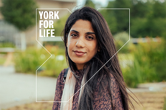 scholar headshot in front of York for Life branding